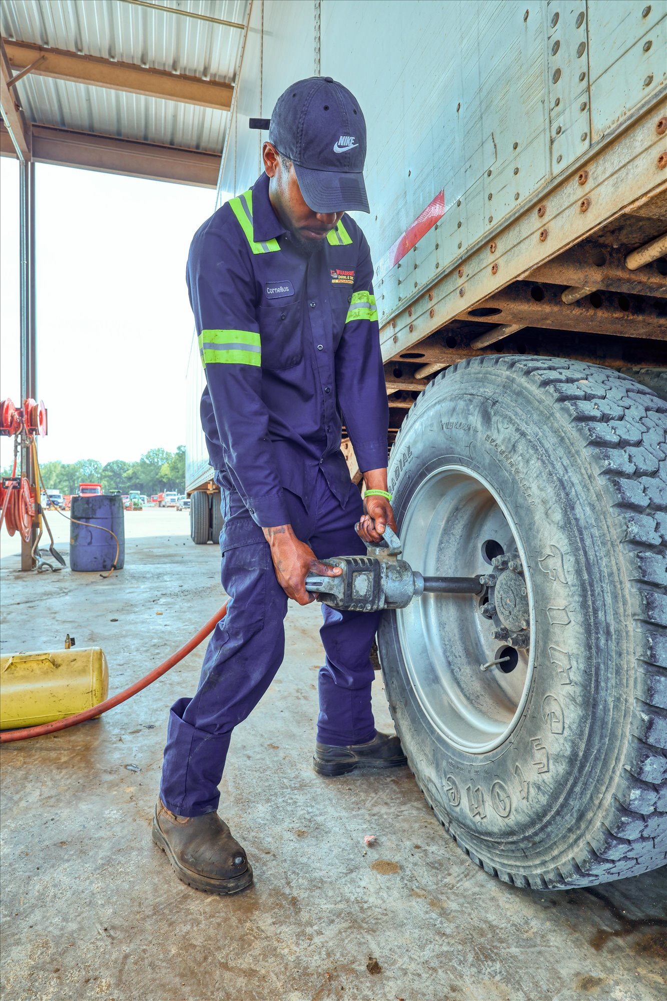 Wilkerson technician working on a commercial truck tire